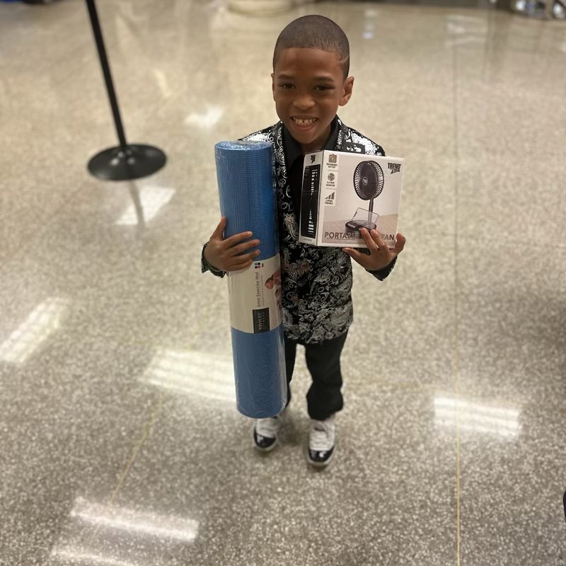 A young guest with a gala prize